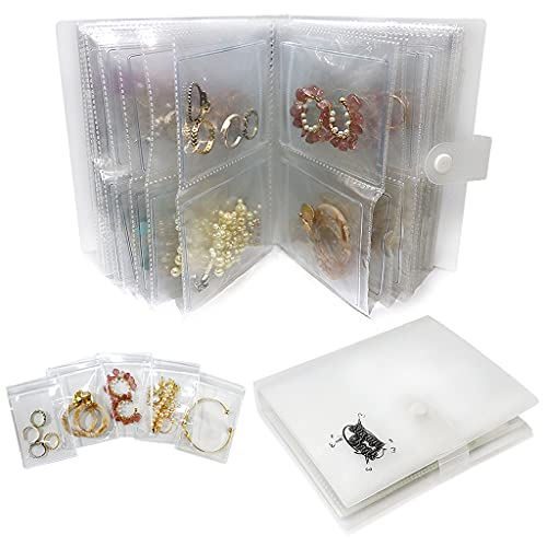Gudong Libro de almacenamiento portátil para pendientes de viaje y joyas de bisutería, libro de almacenamiento de joyas transparente, antioxidación y antideslustre (120 cuadrículas + 50 bolsas de PVC)